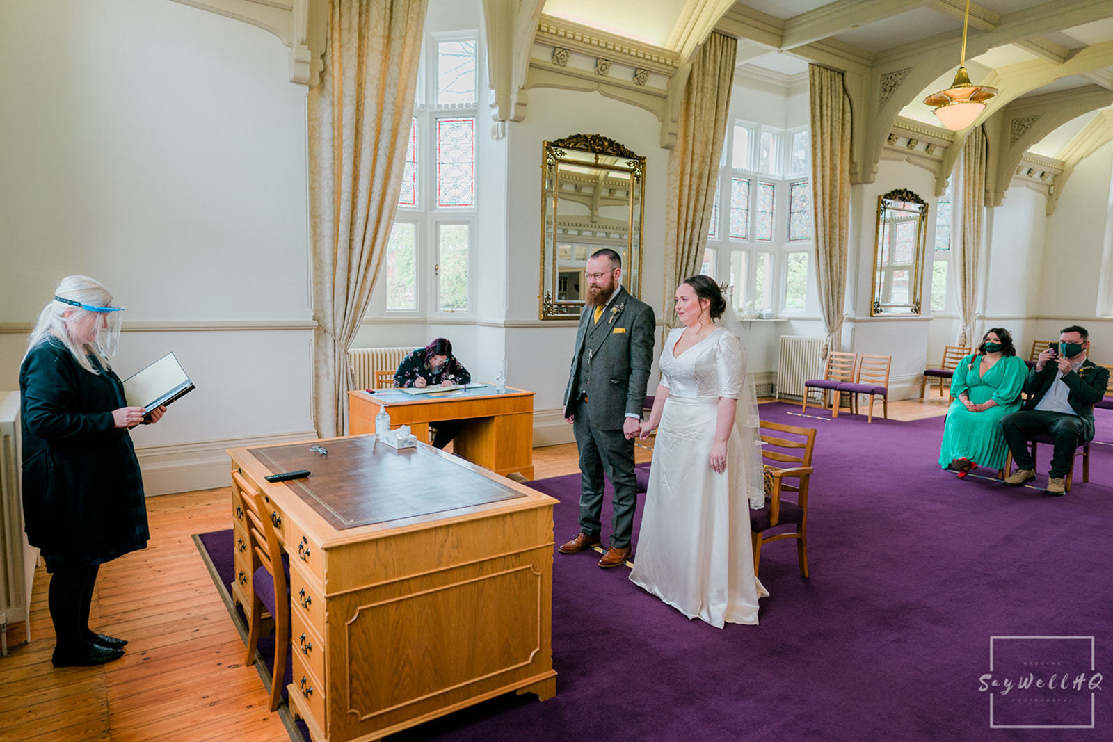 Newark Registry Office Wedding Photography - hide and groom standing in the wedding ceremony room