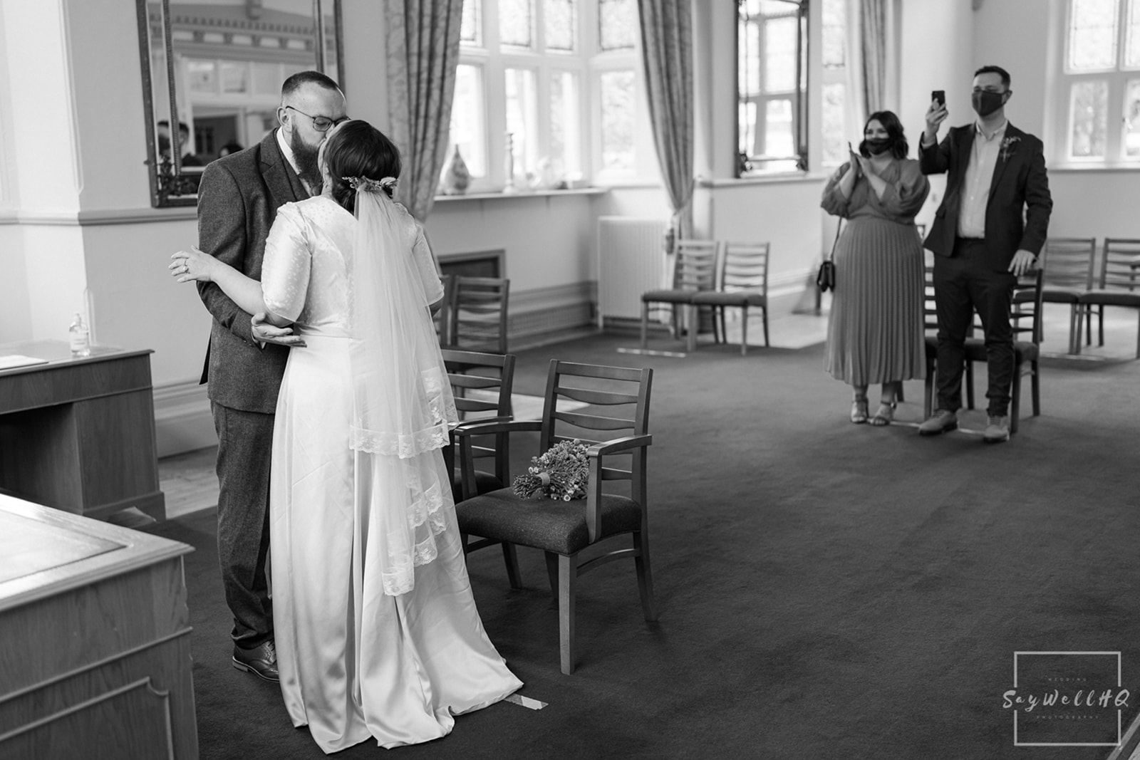 Newark Registry Office Wedding Photography - bride and groom kissed during the wedding ceremon