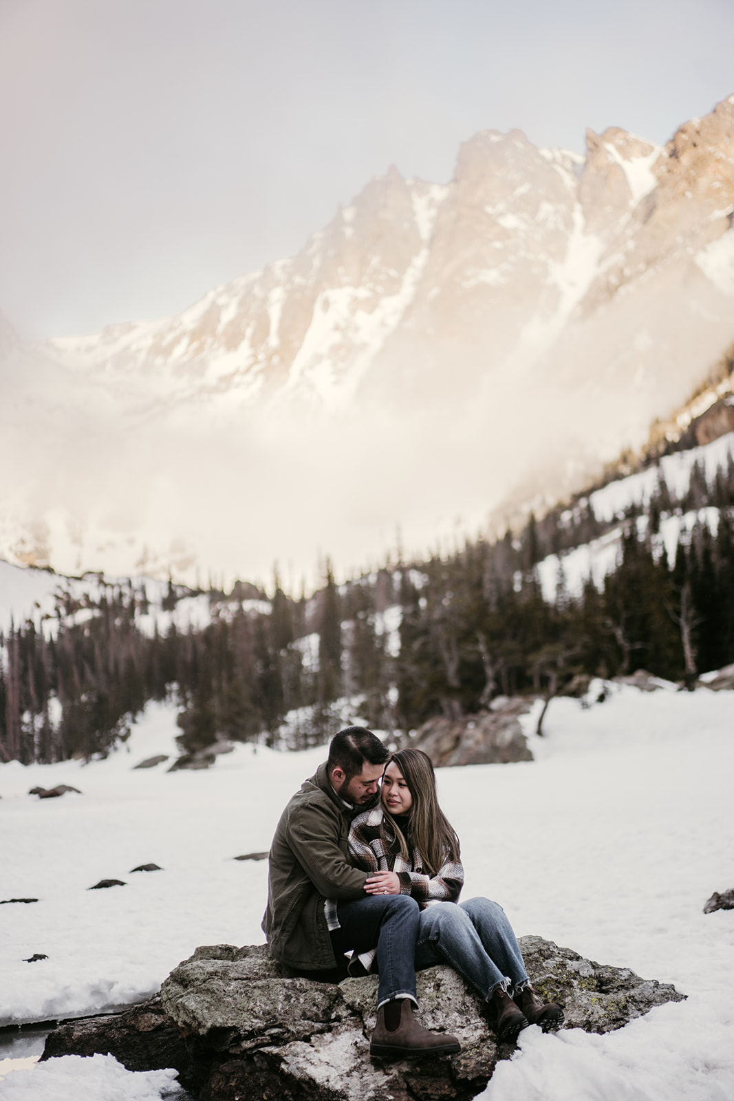 mountain engagement session at frozen lake