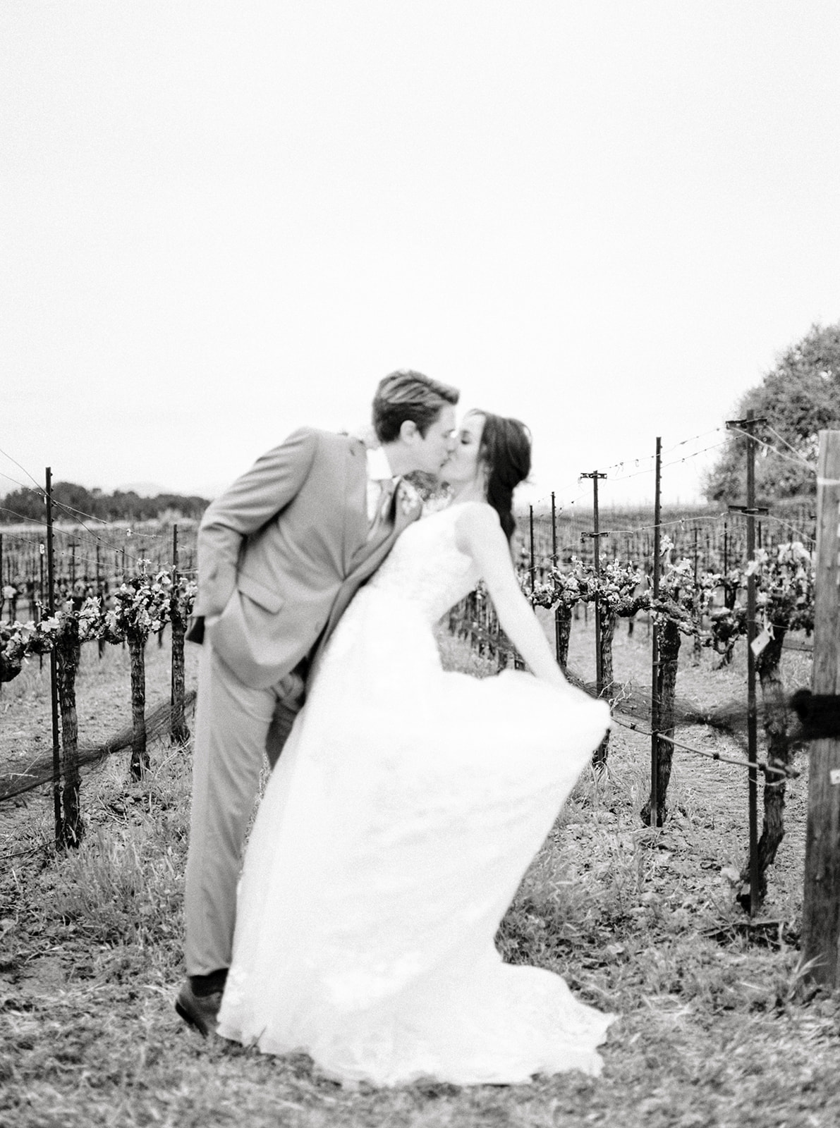 Intimate moment between newlyweds at Sunstone Winery, photographed by Tiffany Longeway, Southern California's luxury wed