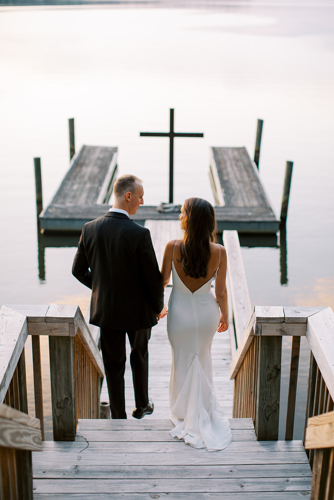 bride and groom at lake dock at Catawba Falls Wedding in South Carolina