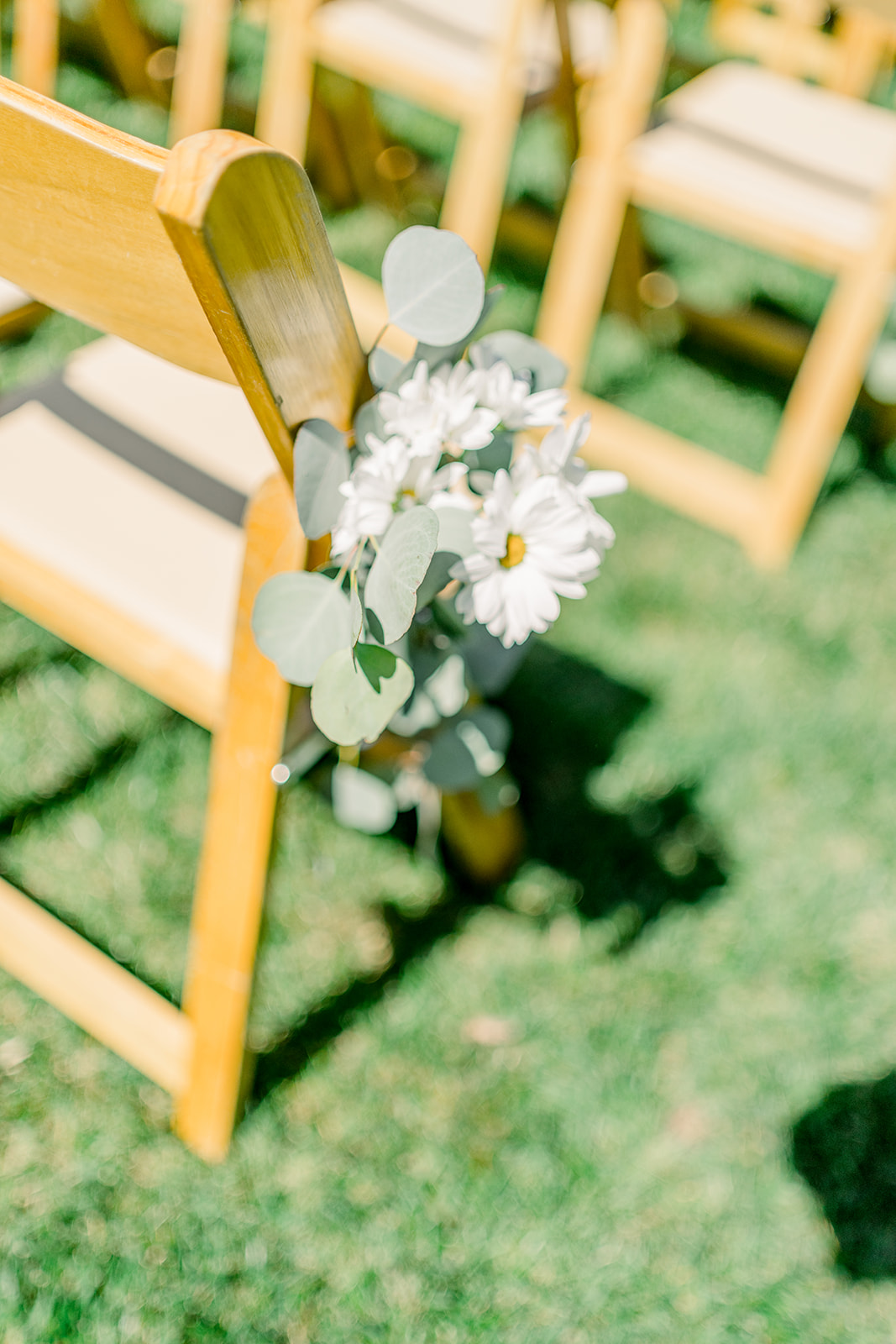 Sonora CA wedding ceremony chairs wood flowers