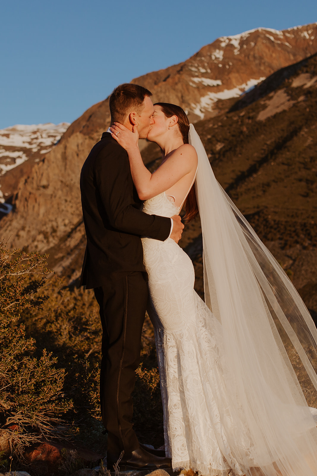 couple celebrates mountainside sunrise elopement