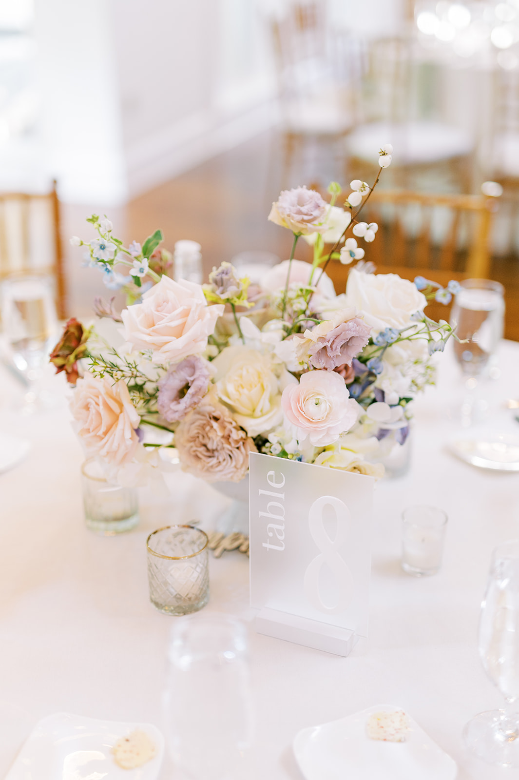 neutral monochromatic florals for a centerpiece at parisian inspired wedding at Pomme in Radnor, PA