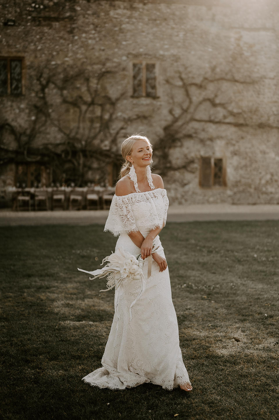 bride at forde abbey at sunset