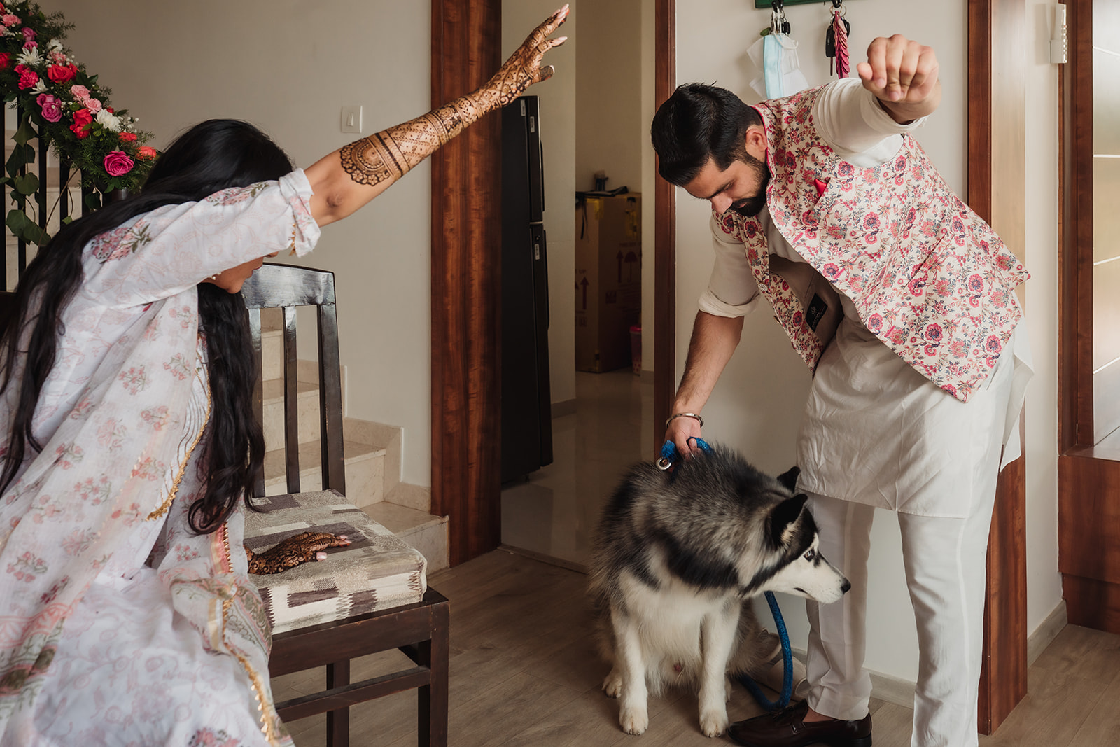 Four-legged family member: Bride and groom include their adorable pet in a delightful wedding snapshot