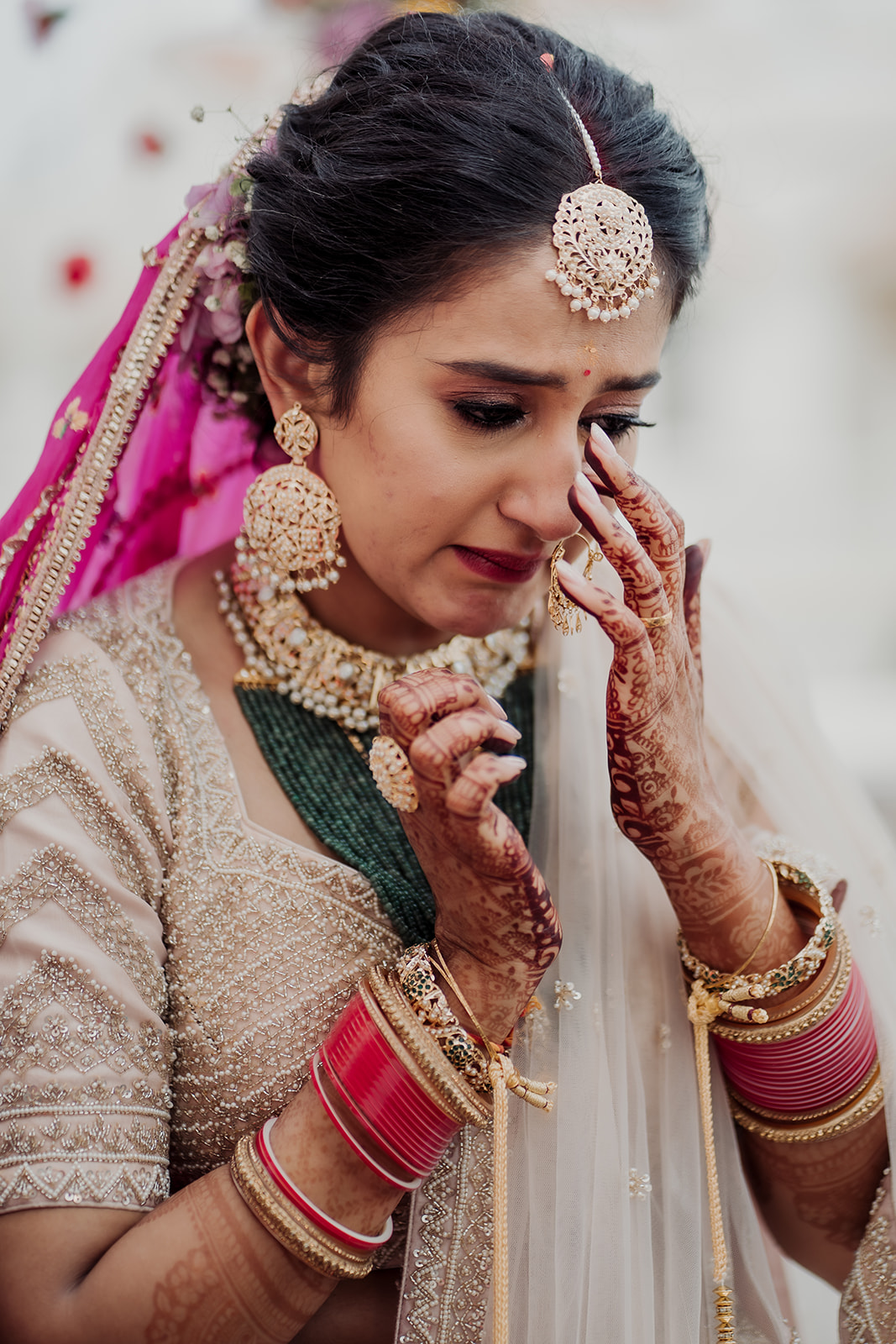 Emotional bride: Tears of joy glisten in the bride's eyes after a heartfelt wedding ceremony