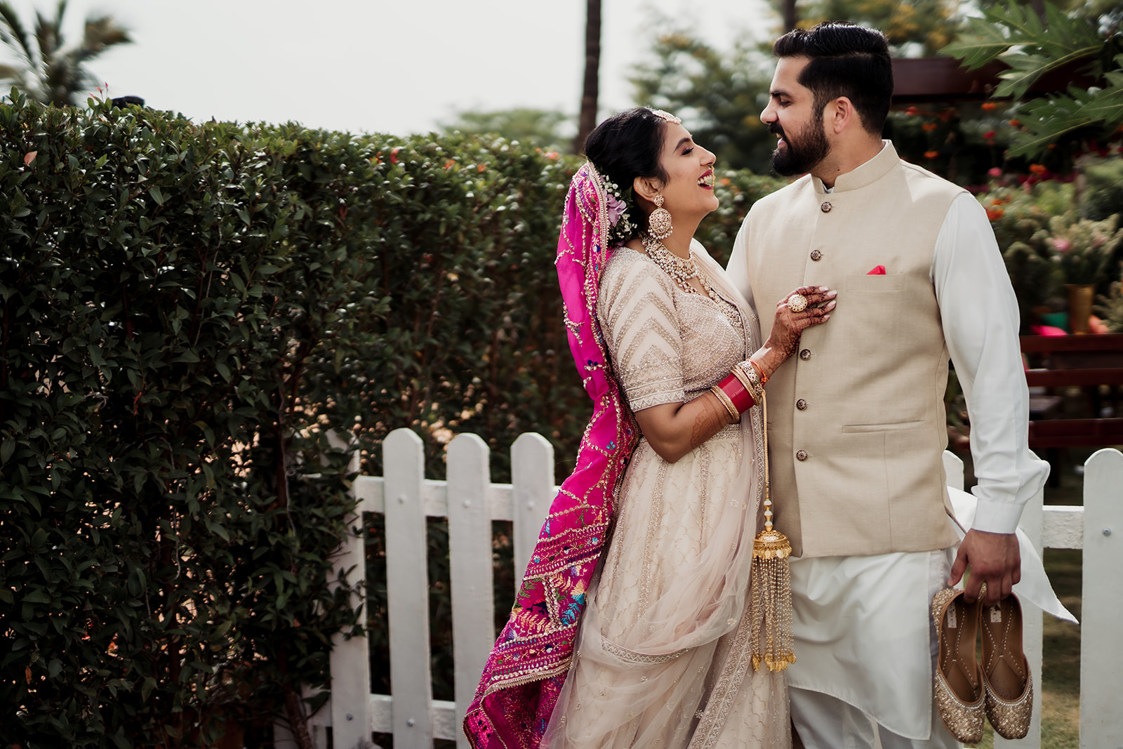 Wedding elegance: The bride and groom exude timeless charm in their beautifully coordinated wedding attire