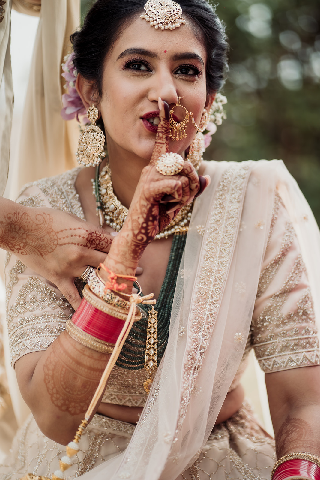 Portrait of elegance: The bride stands as a vision of grace and poise in this beautifully captured bridal portrait