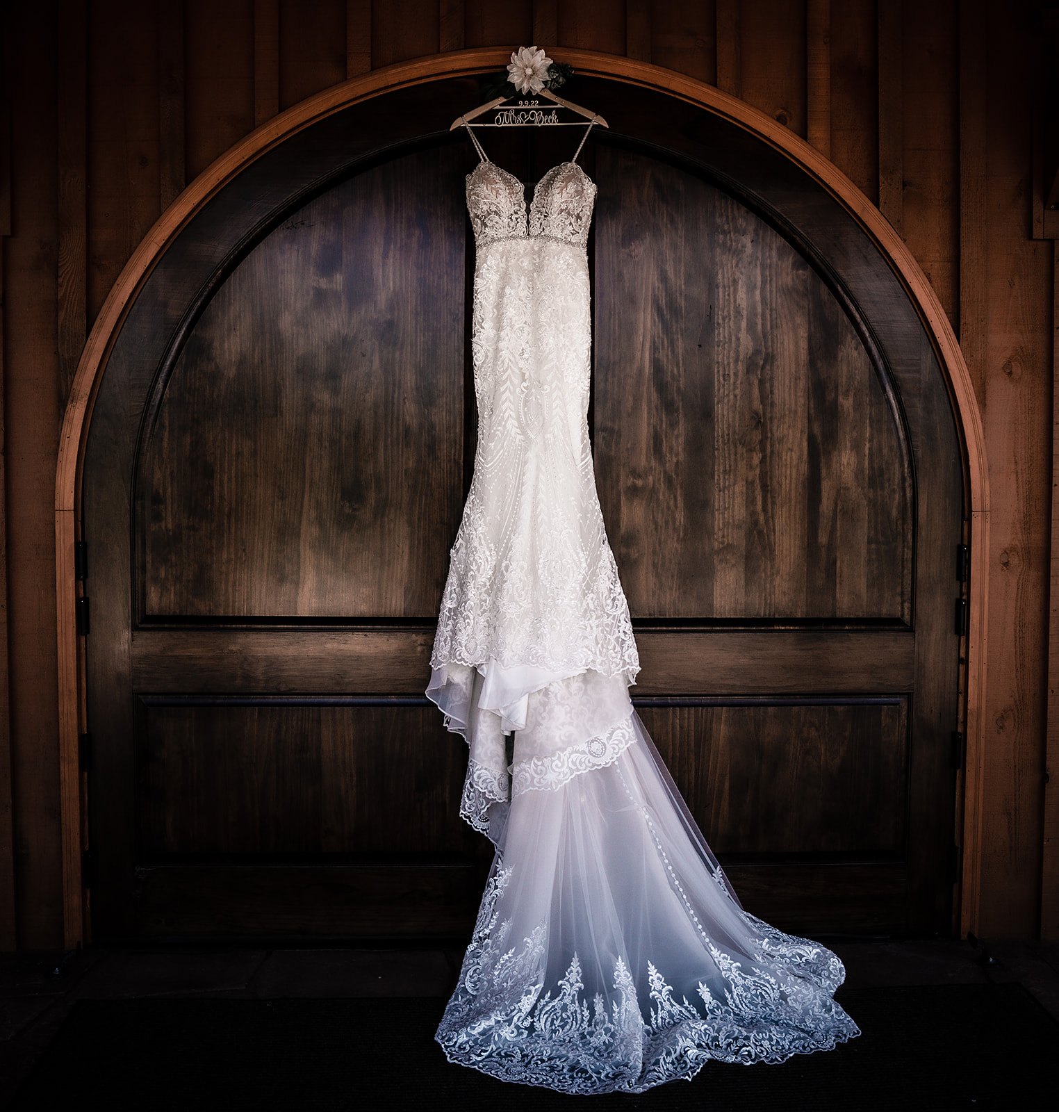 wedding dress on wooden door Rolling Meadows Ranch Lebanon, Ohio