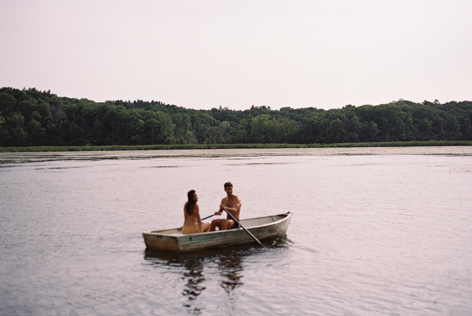 Chaarg founder, Elisabeth Sinnott, and her husband in a canoe at Lake Wandawega on their wedding weekend