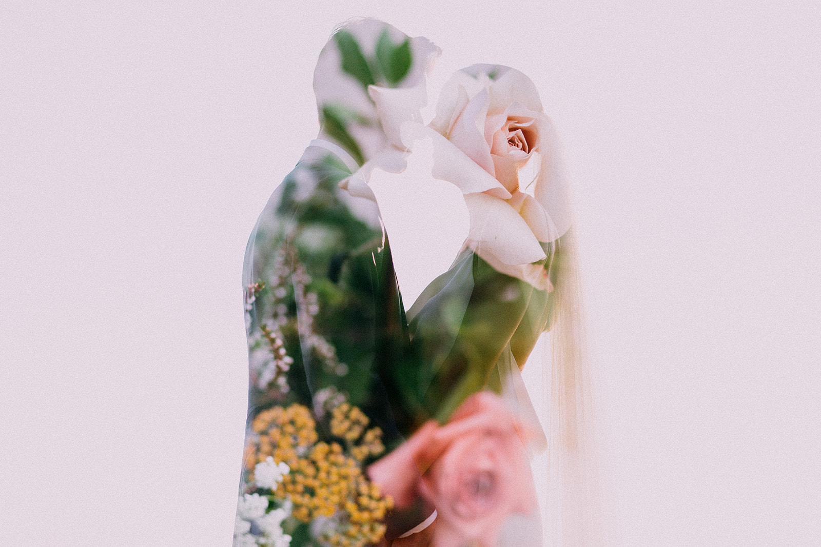 Double exposure of a couple with florals at Camp Wandawega