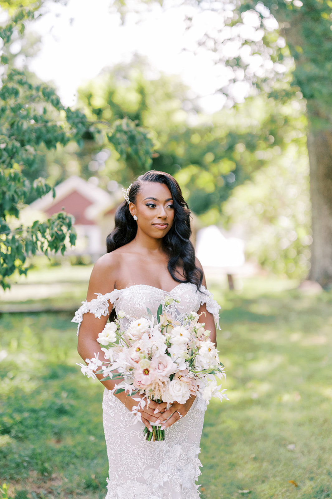 beautiful black bride poses on lawn Summer Crossed Keys Estate Wedding by Haley Richter Photography