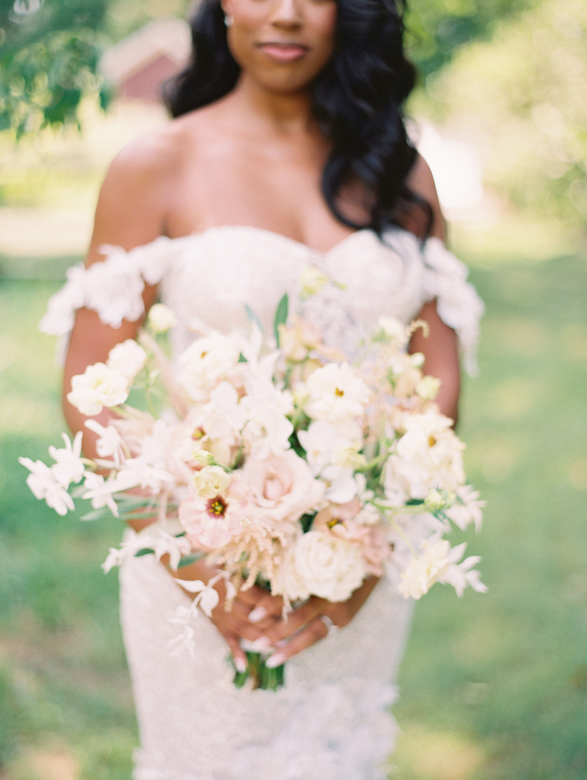 beautiful soft cream bouquet from Summer Crossed Keys Estate Wedding by Haley Richter Photography