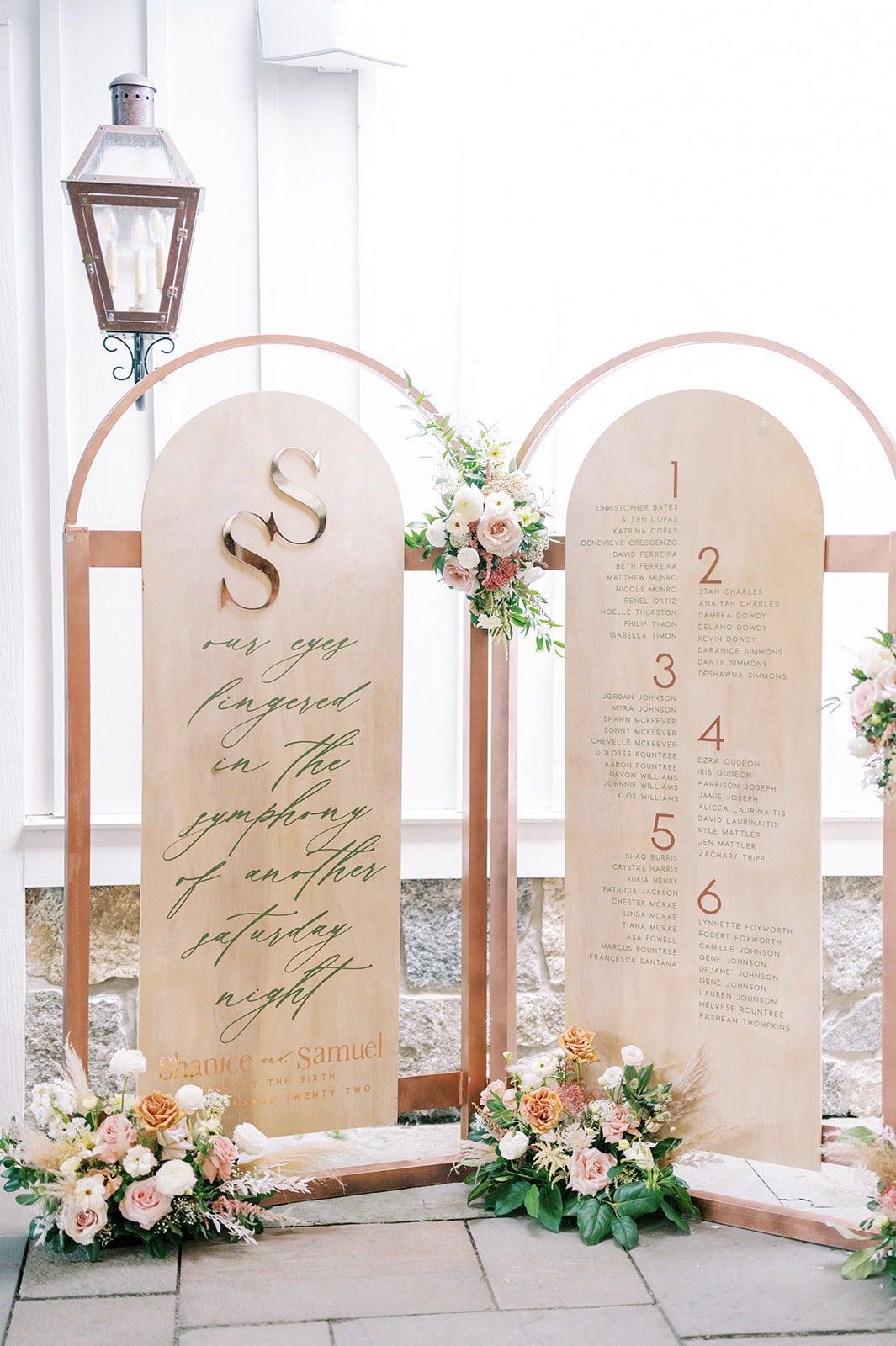 elevated modern arched seating chart display for Summer Crossed Keys Estate Wedding by Haley Richter Photography