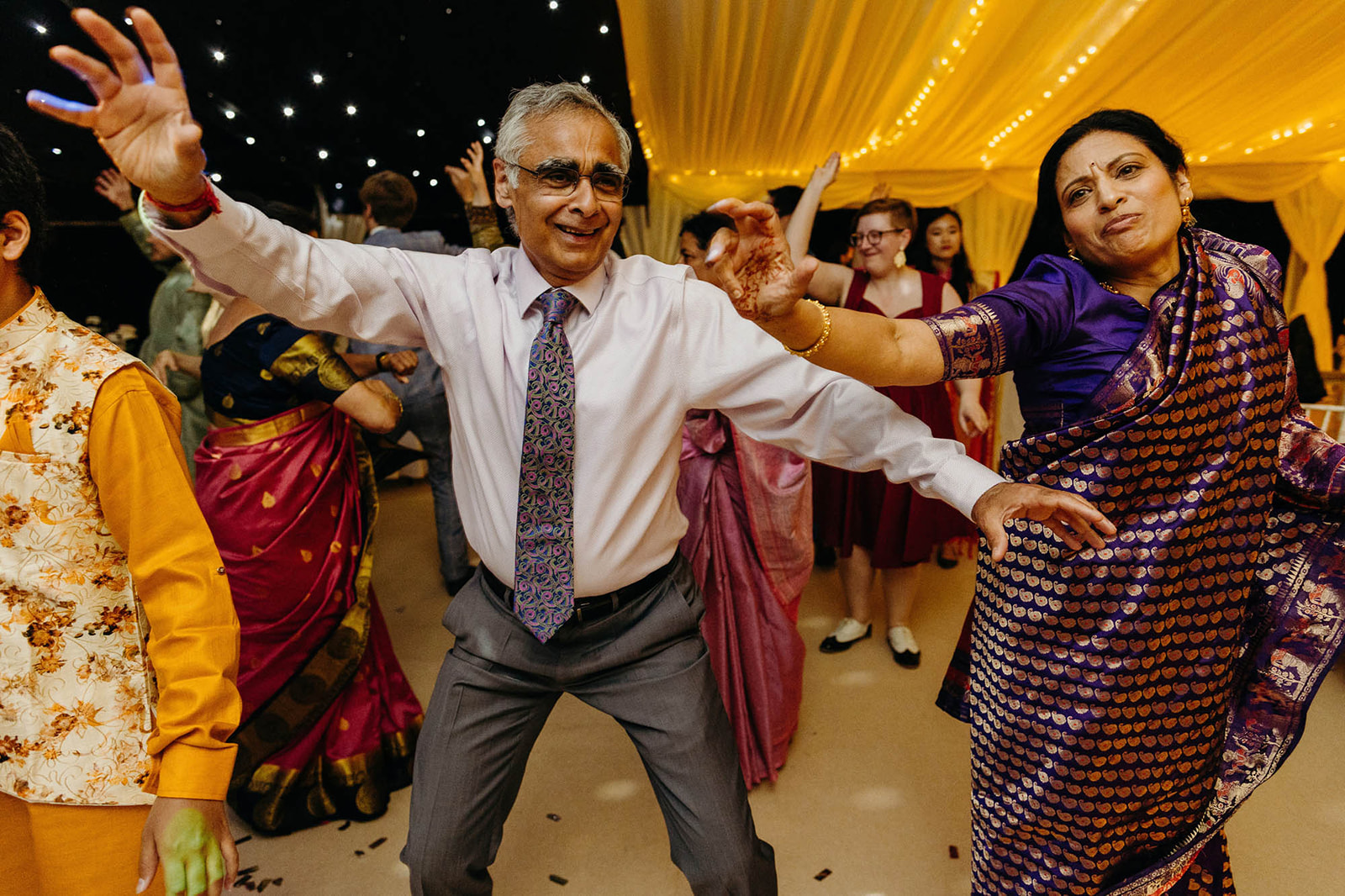 guests doing Bhangra at wedding in Wales