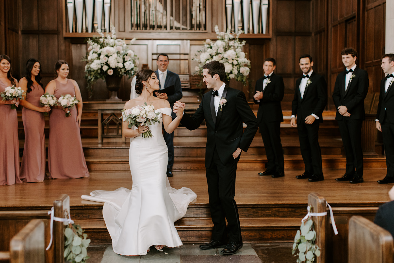 Documentary photo of couple celebrating their ceremony at Scarritt Bennett Skinner Chapel in Nashville, Tennessee