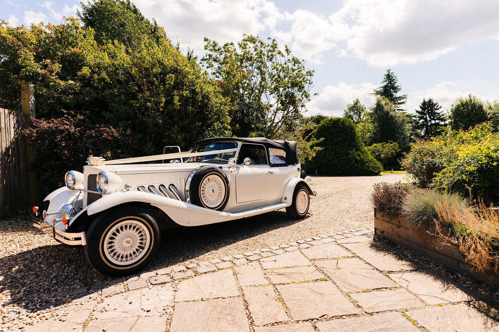 Shottle Hall Wedding Photography - the bride arriving in a wedding car