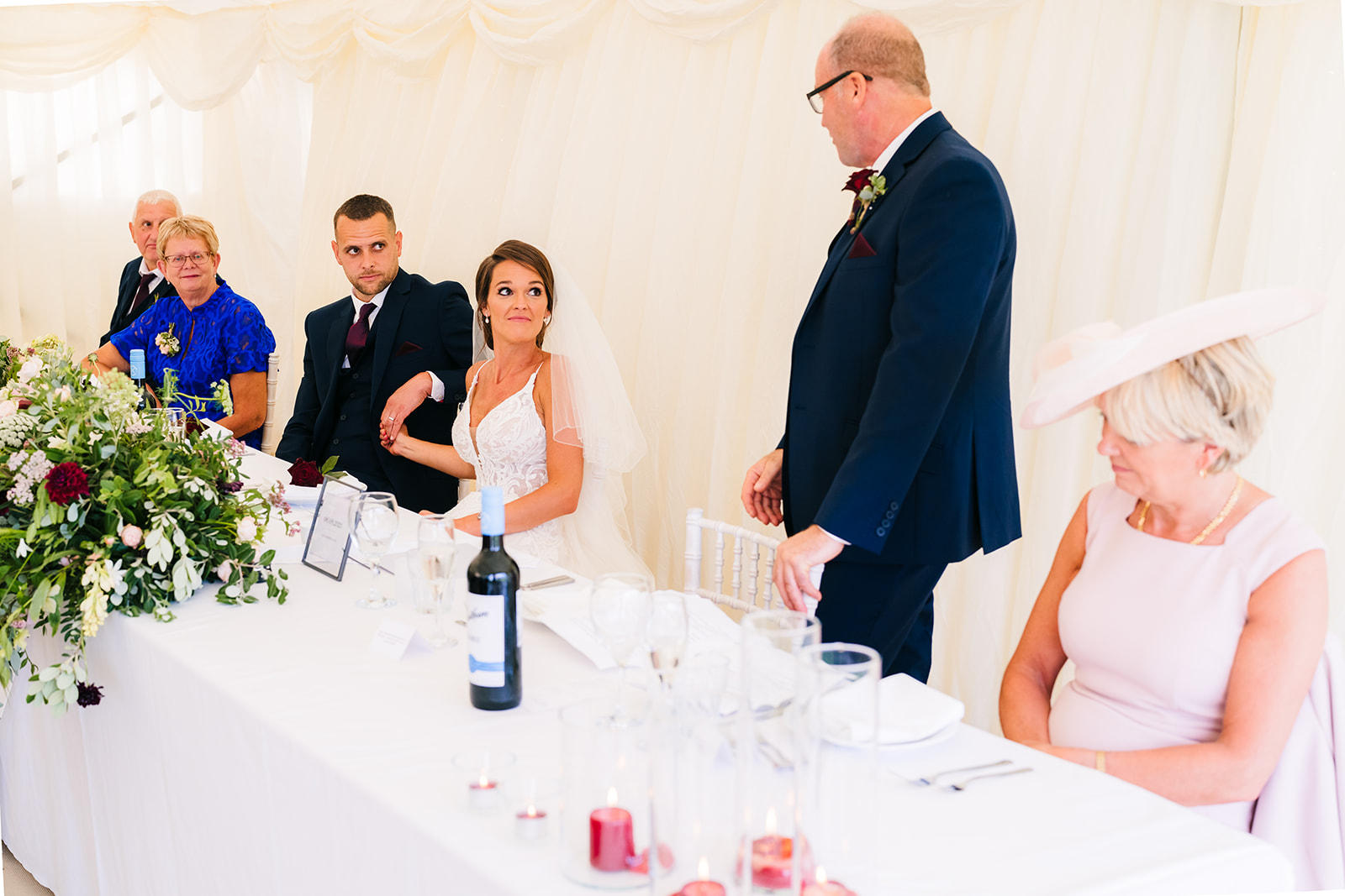 Bride and groom react to the father of the bride wedding speech

