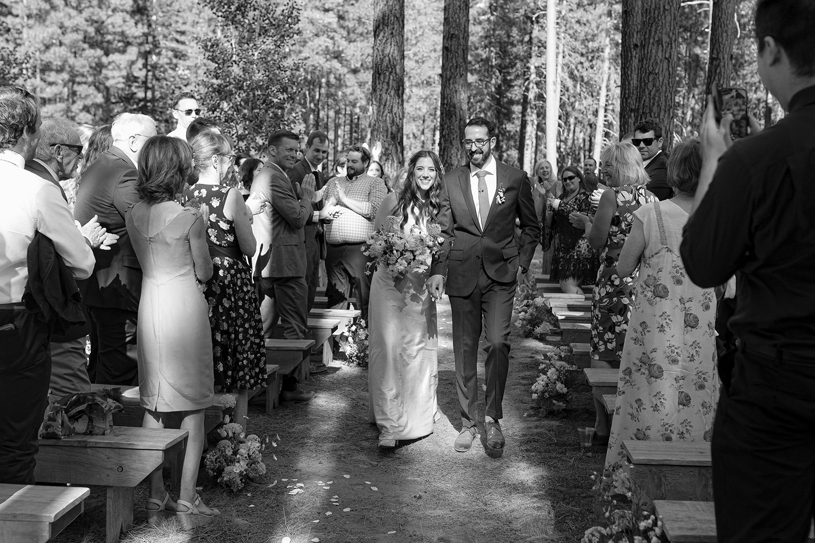 bride and groom walking down the aisle central oregon
