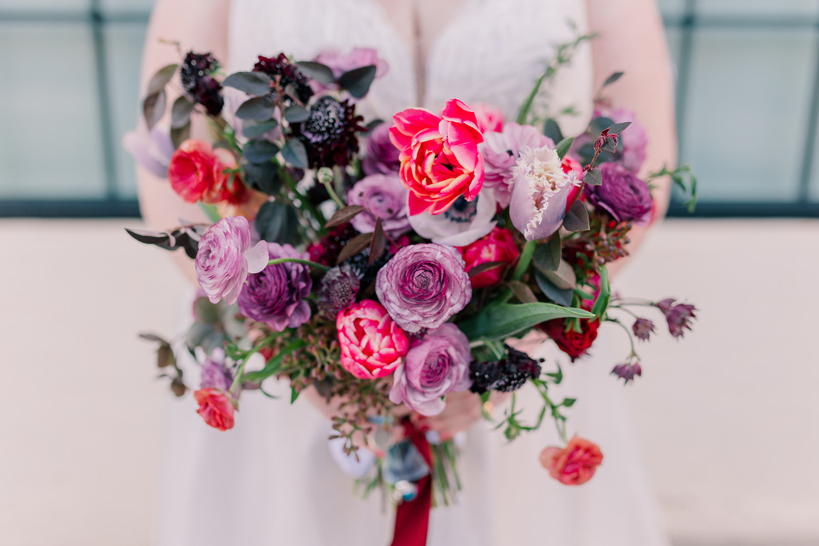 Gorgeous floral bouquet showcasing pinks and purples.