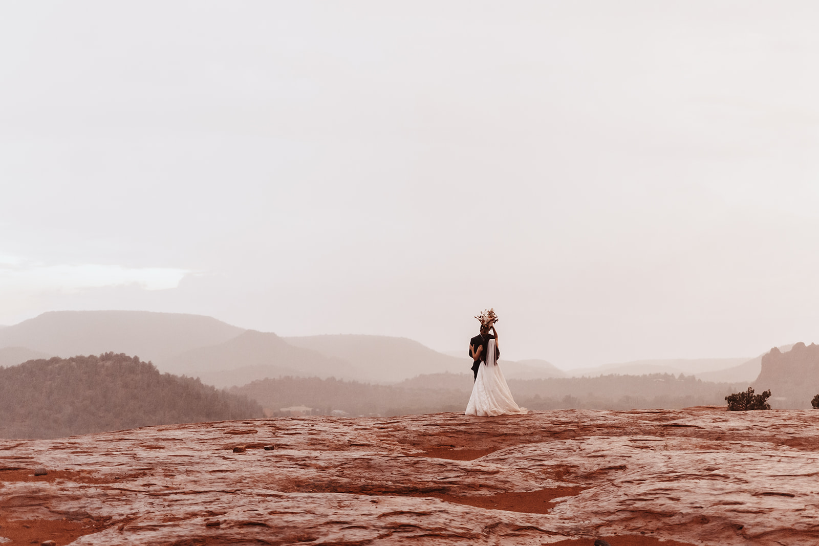 A couple who eloped in sedona in the rain