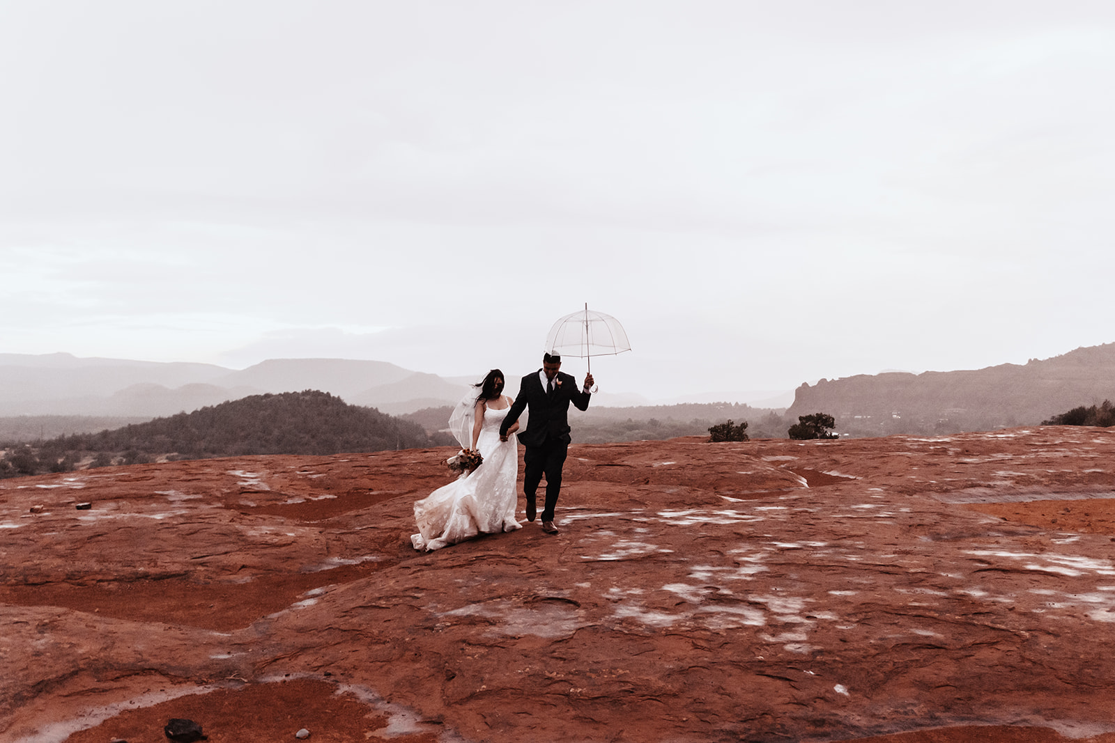 A couple who eloped in sedona in the rain