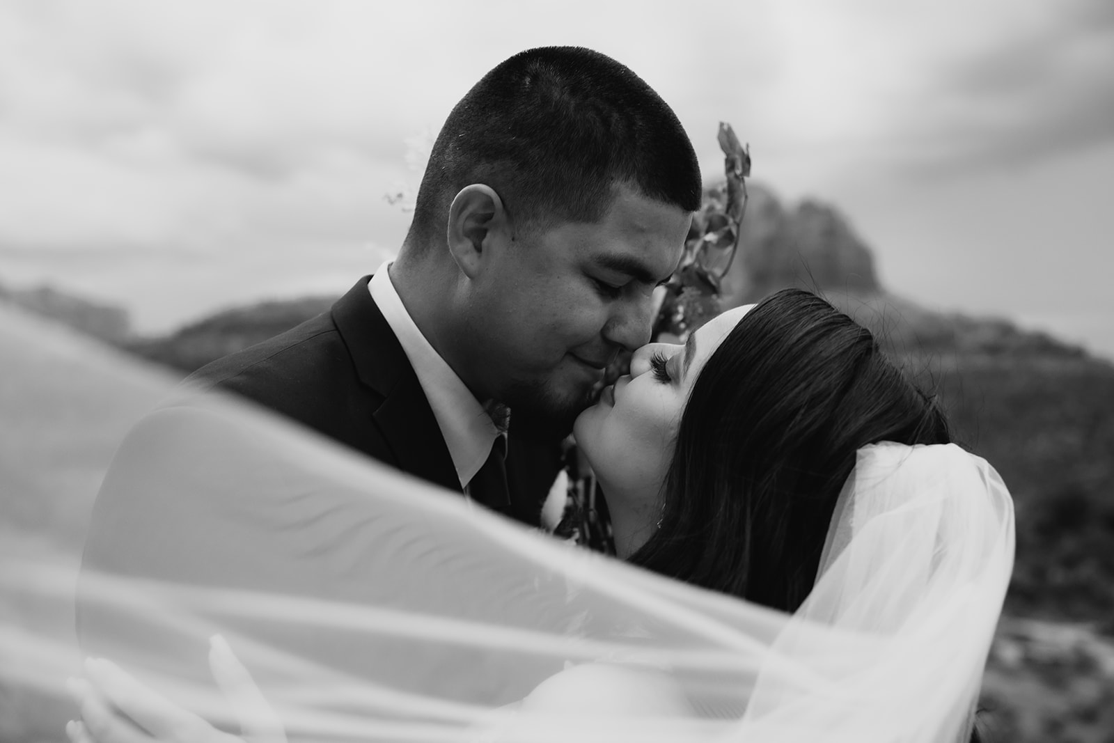 A couple who eloped in sedona under a veil