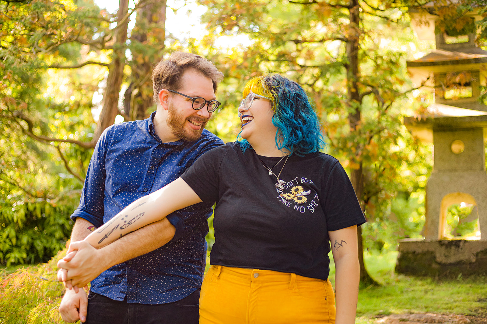 colorful queer couple holding hands