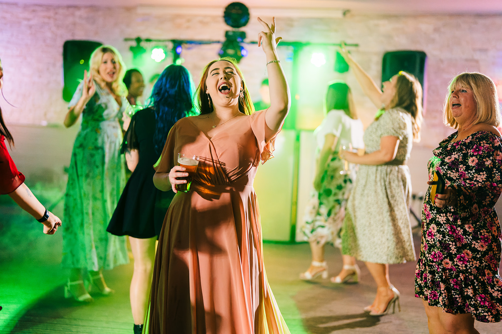 The Brewhouse & Kitchen Wedding Photography - bridesmaid dancing during the wedding disco