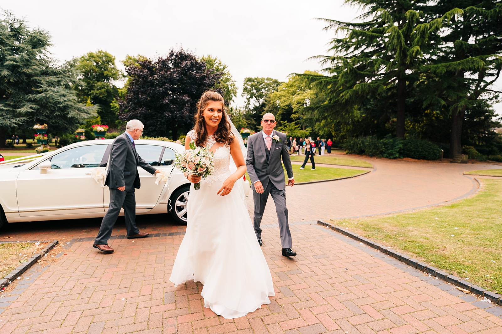 The Brewhouse & Kitchen Wedding Photography - the bride arriving at the registry office for the wedding