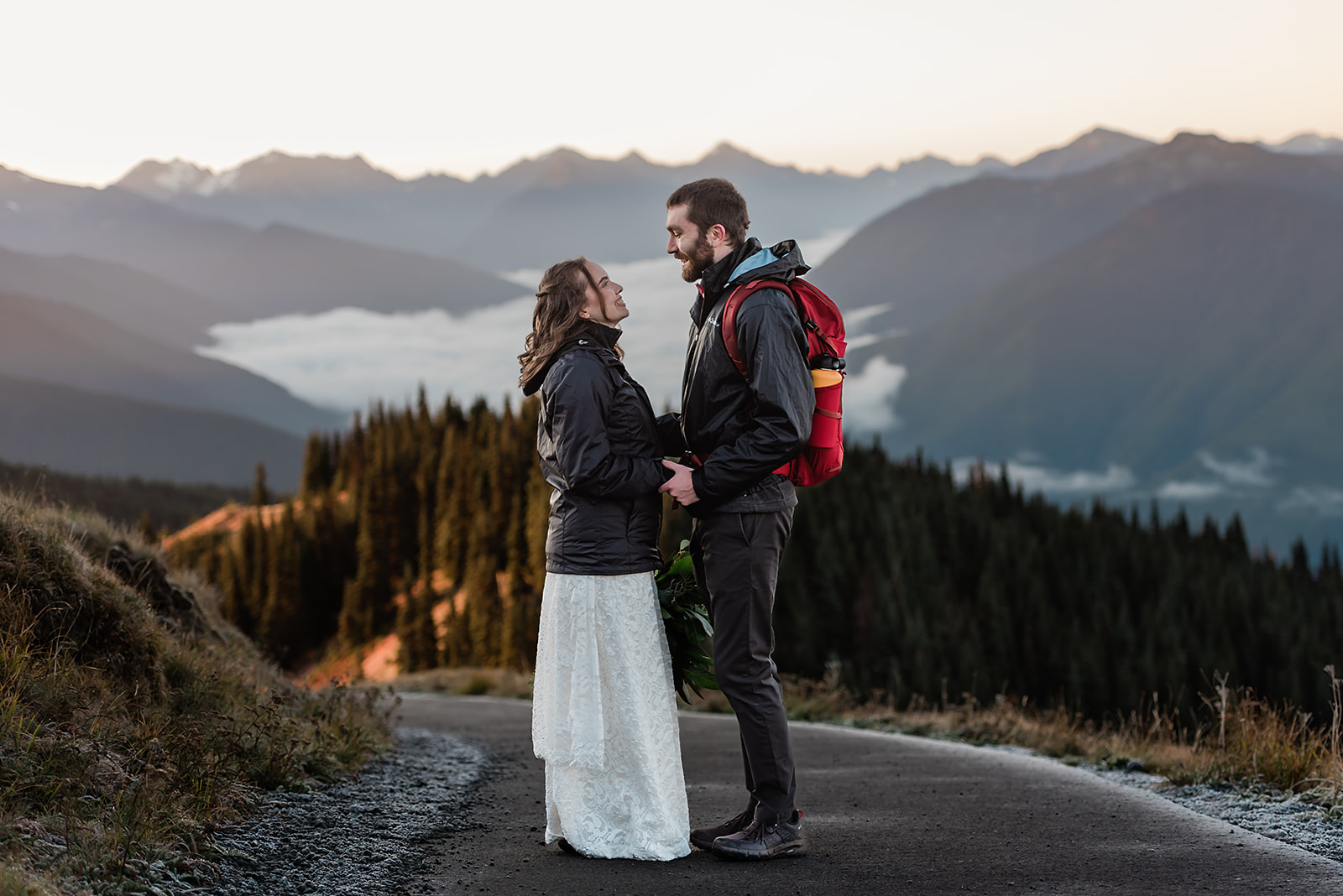 This is a picture of a bride and groom during their Olympic National Park elopement on a mountainside.