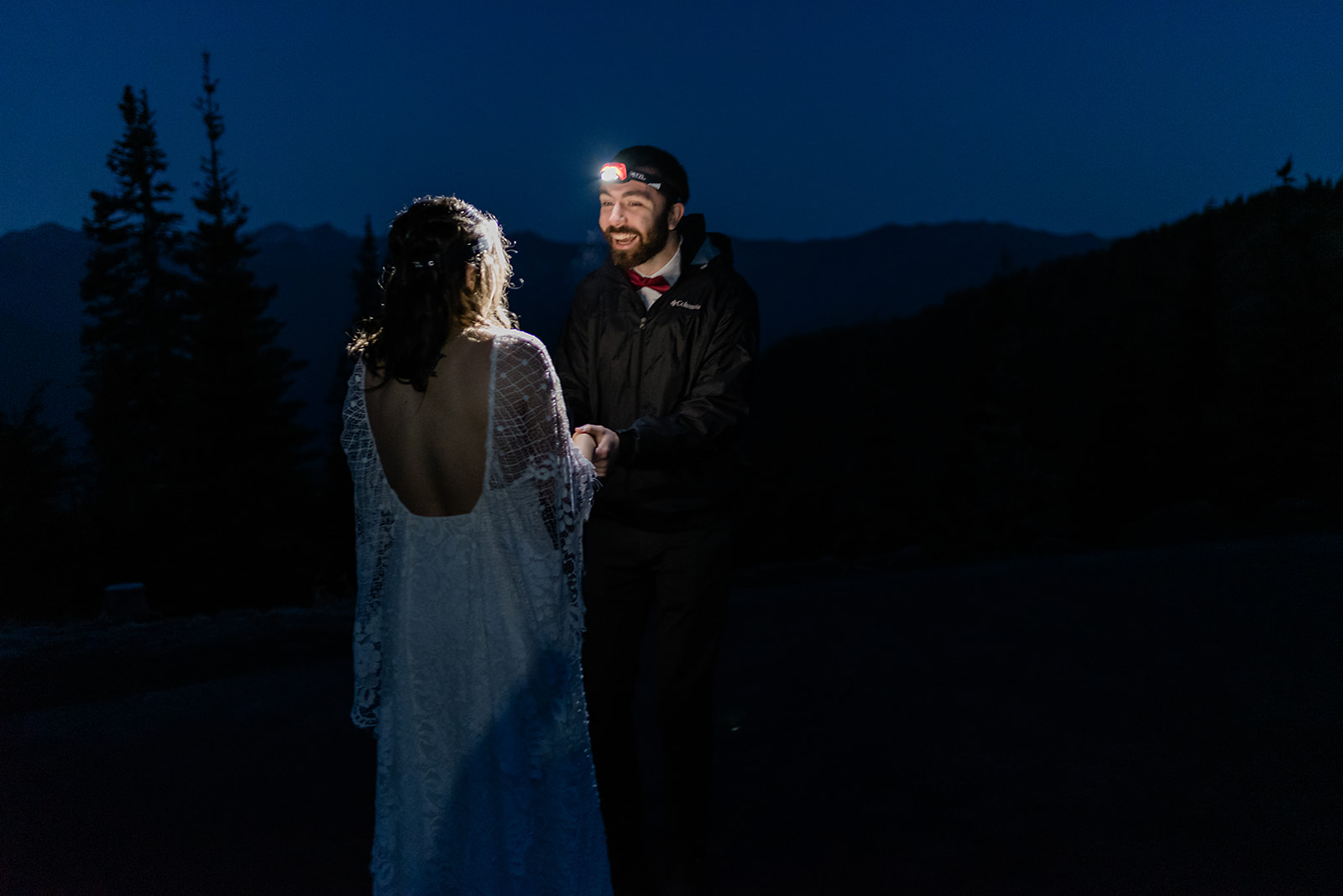 This is a couple on their wedding day before the sun has risen.