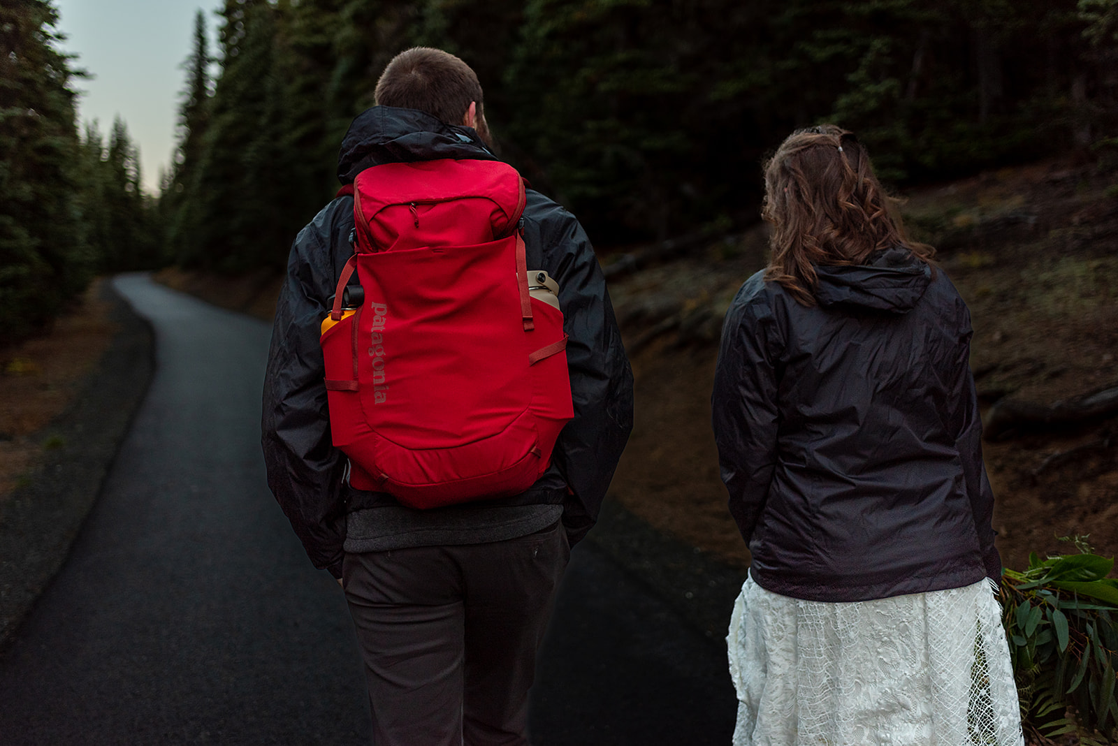 This is a picture of a couple walking to their adventure elopement.
