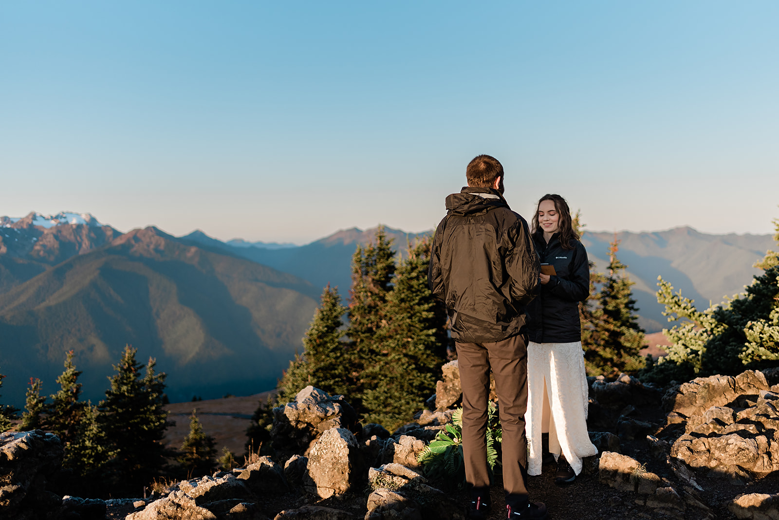 This is a picture of an adventure elopement happening on a mountainside.