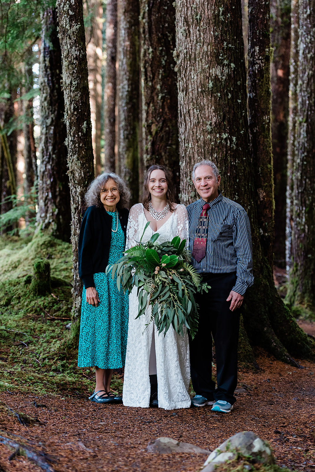 This is a portrait of the bride with loved ones.