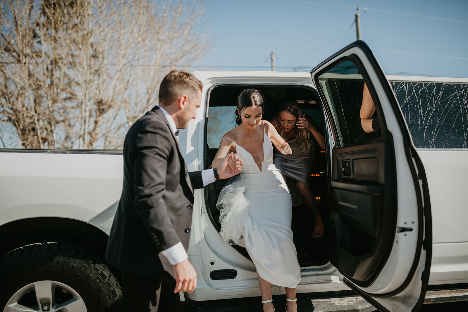 Bride and groom in Limo