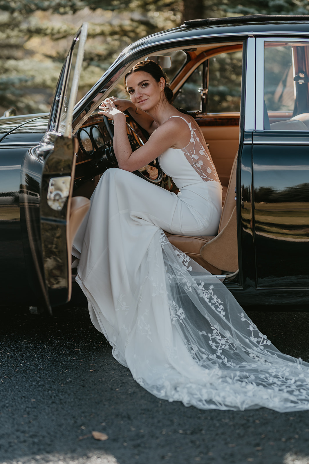 bride in a vintage Jaguar 