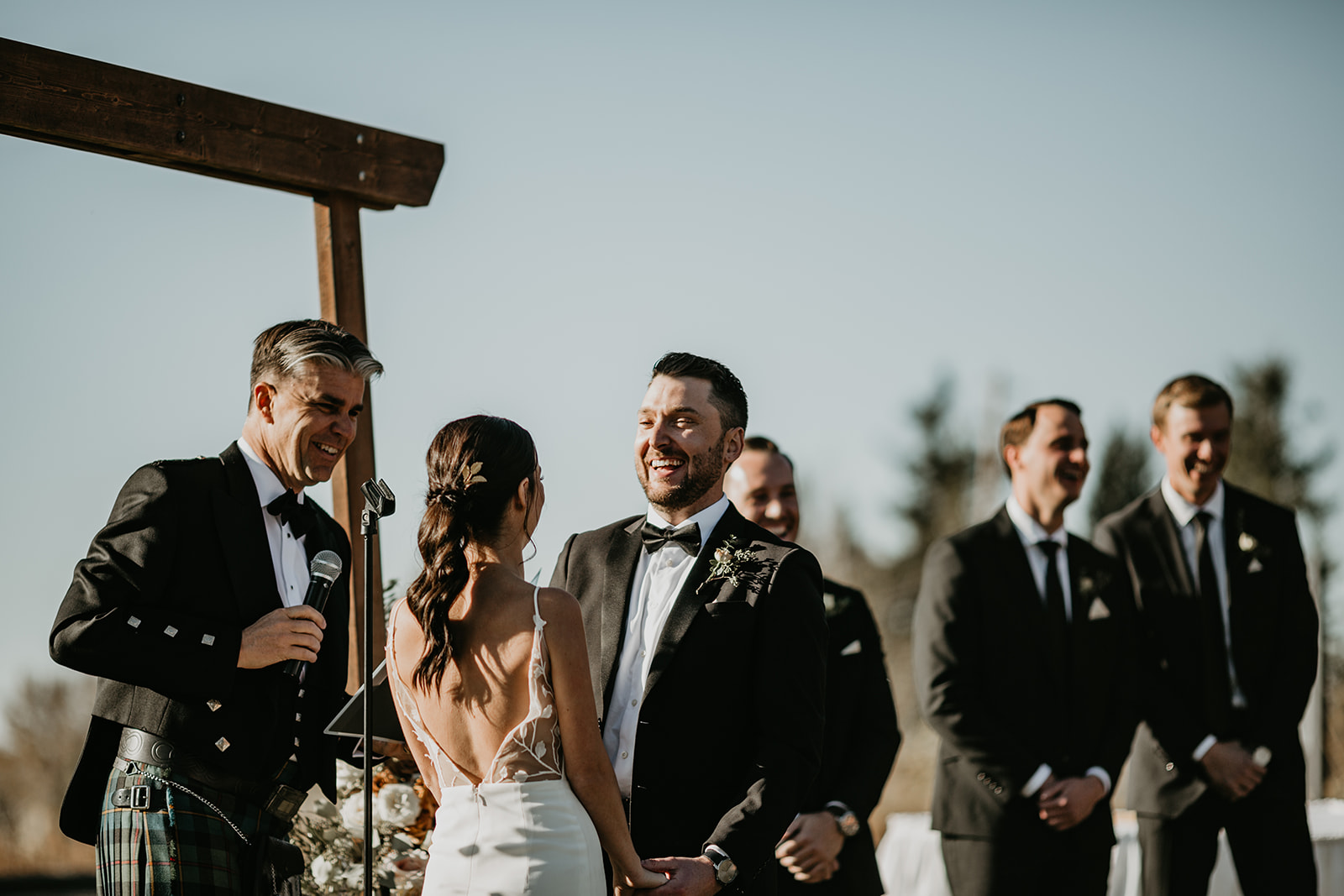 Groom and bride at Calgary Pinebrook Golf Club wedding ceremony