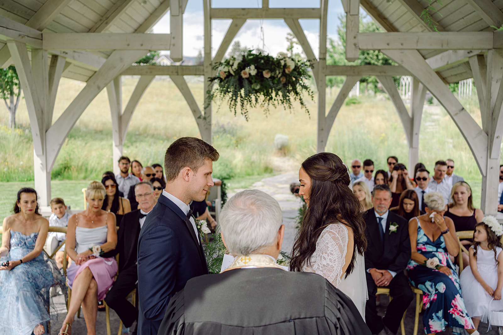 Ceremony at Sanctuary Gardens kelowna Wedding