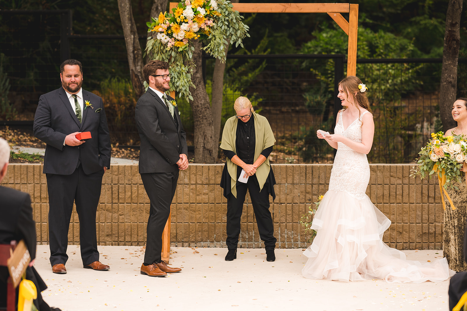 Bride and groom exchanging vows at their intimate Napa Valley wedding ceremony