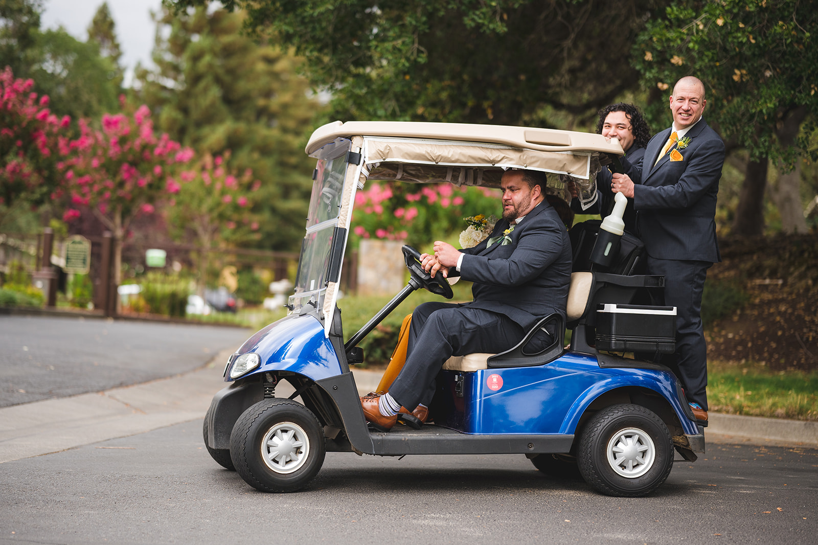 Laughter and joy as the wedding party drives golf carts around Silverado Golf Course