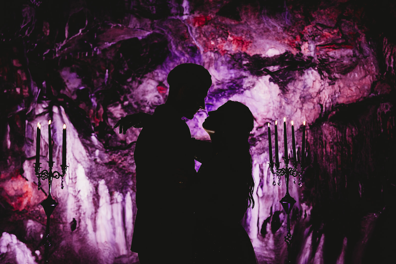 dramatic lighting Indian Echo Caverns spooky halloween fall wedding bride groom portraits