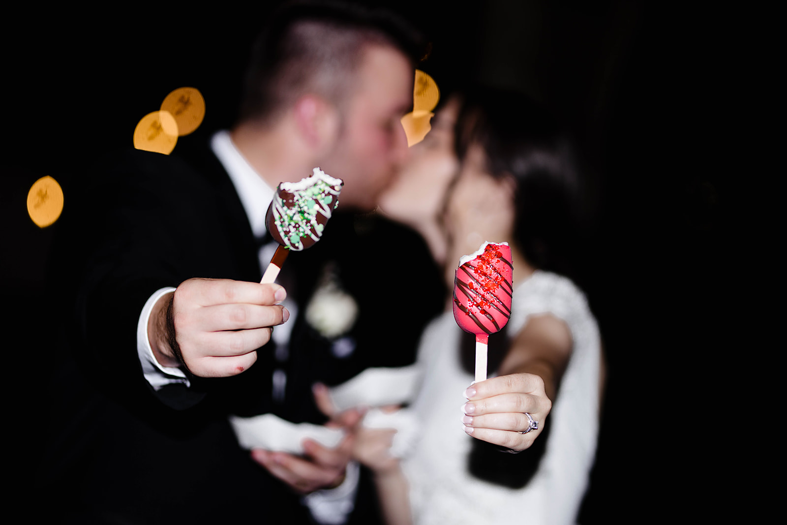 newly weds eating dessert at their wedding venue creekside acres | detriot wedding photographer 