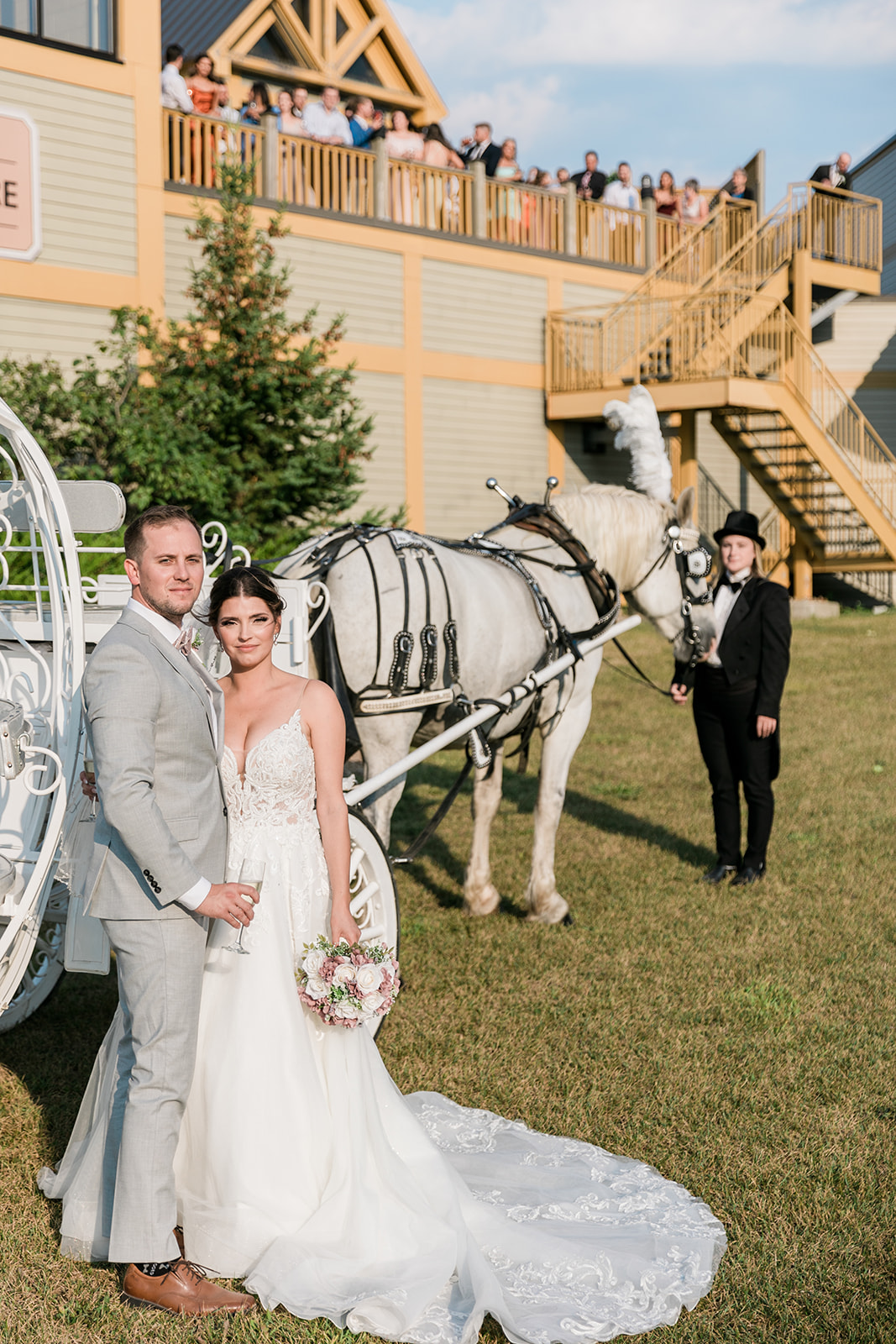 bride and groom with horse and carriage