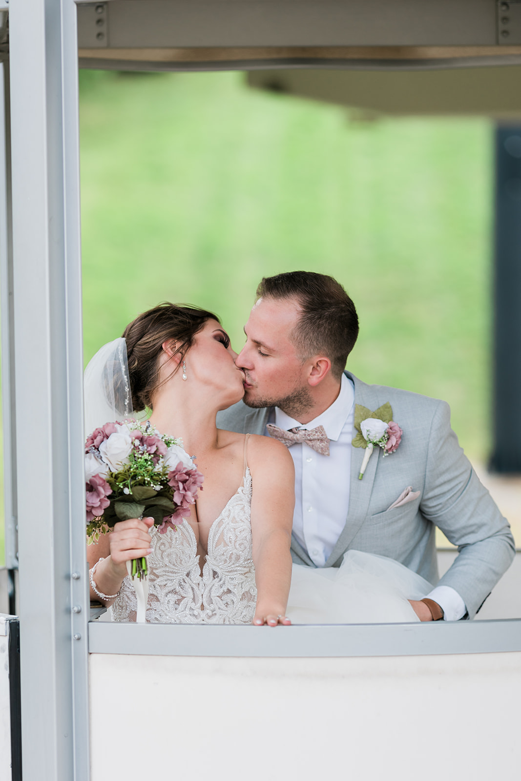 Bride and Groom Kissing in the Blue Mountain Resort Gondola