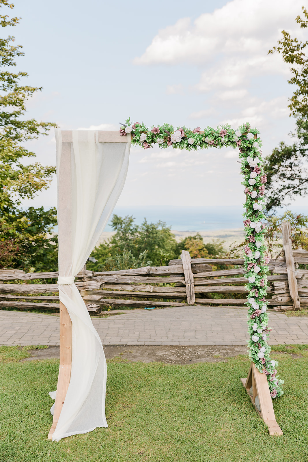 Ceremony arch with floral decor