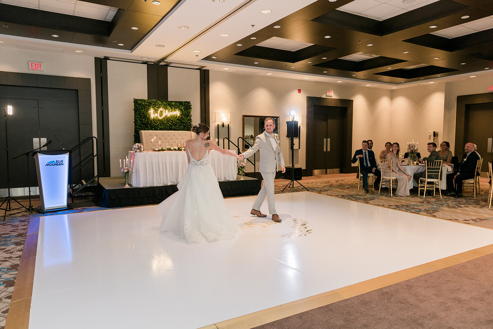 Couple making their grand entrance into their reception