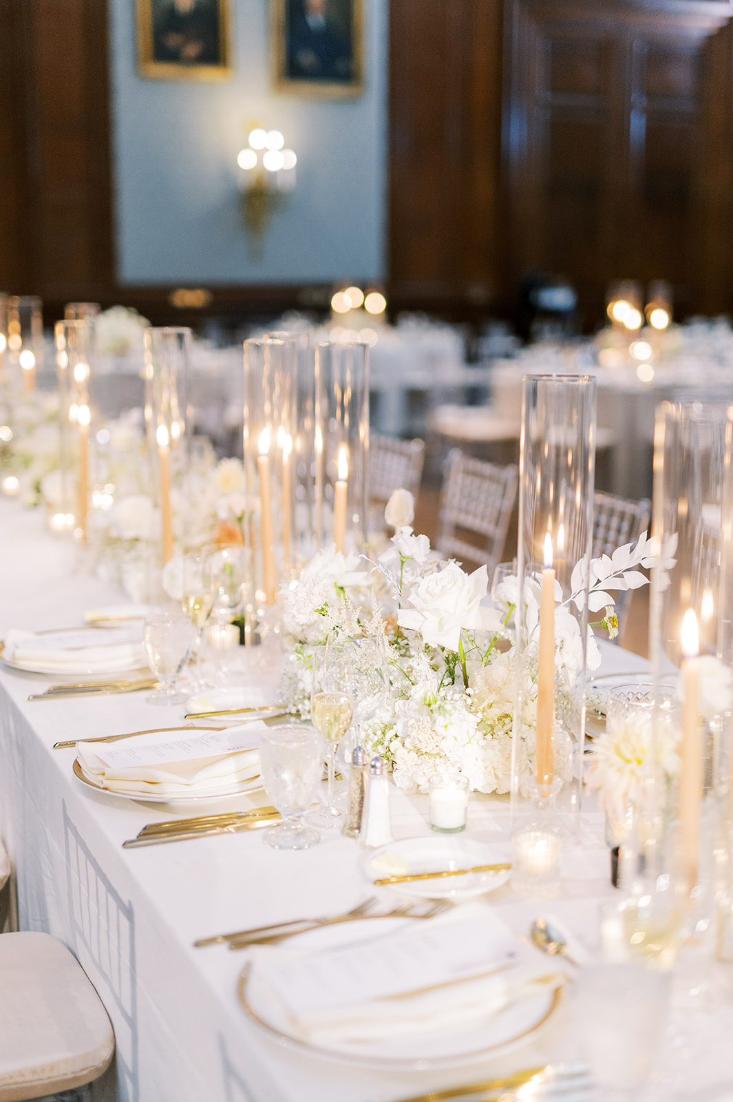 romantic and modern monochromatic white table setting for autumn union league of philadelphia wedding