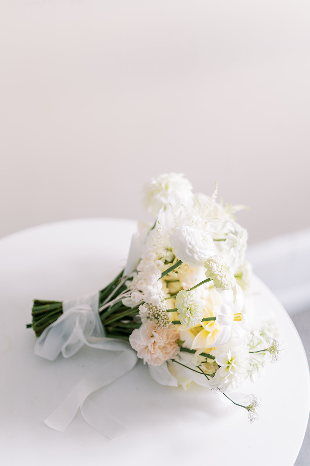 simple soft white bridal bouquet for union of philadelphia wedding